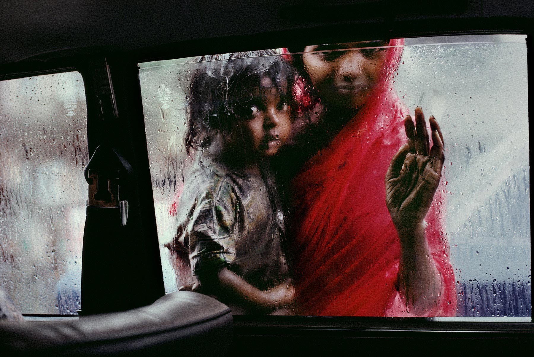 Mother and child at my car window