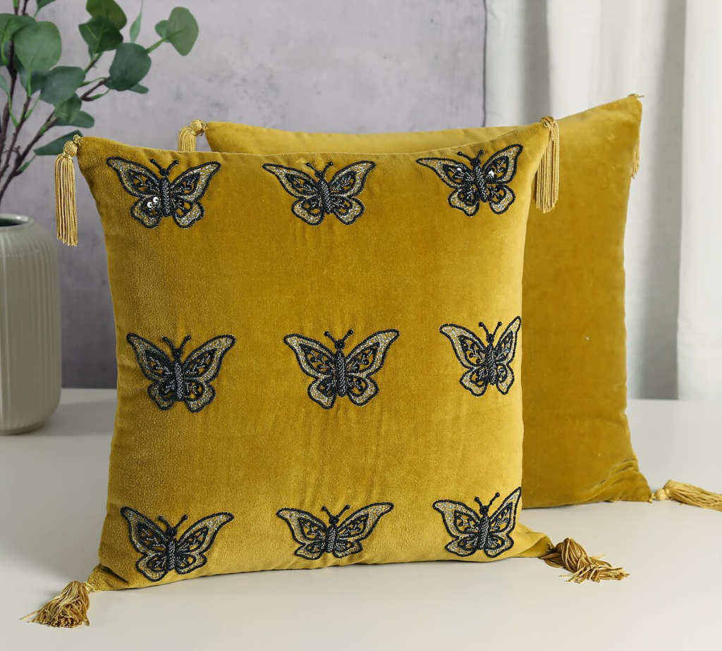Aureolin Butterfly Adorn Cushion Cover by India Circus