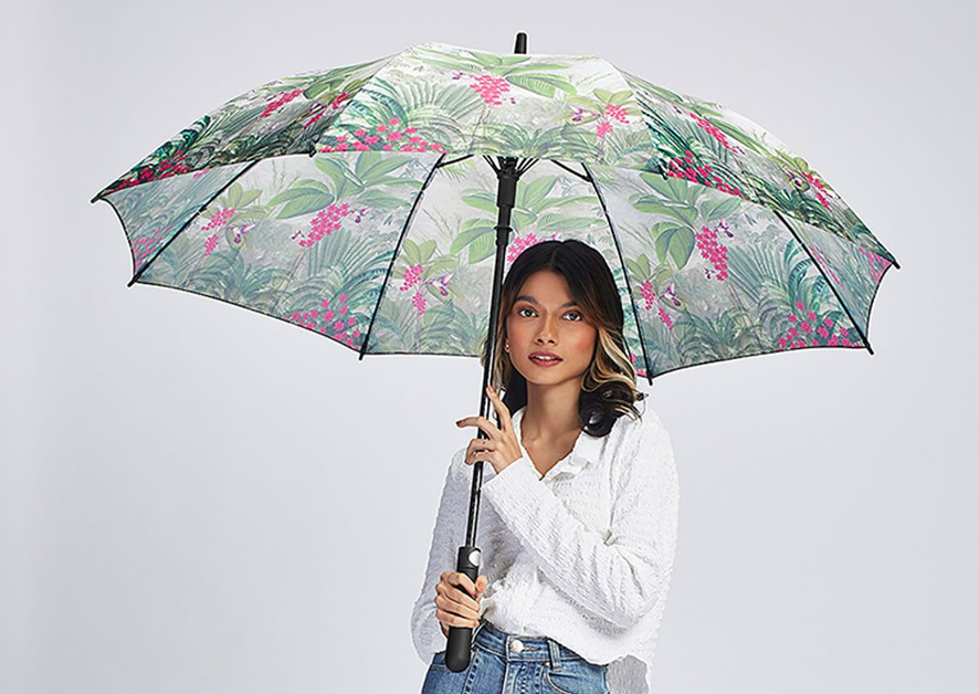 Weather the storm with the tropical view long umbrella online at India Circus